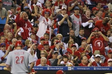 Philadelphia Phillies fans jeer Cincinnati Reds Scott Rolen after his strike-out during the third inning in Game 2 of the MLB National League Division Series baseball playoffs in Philadelphia, Pennsylvania, October 8, 2010. REUTERS/Tim Shaffer (UNITED STATES - Tags: SPORT SPORT BASEBALL)